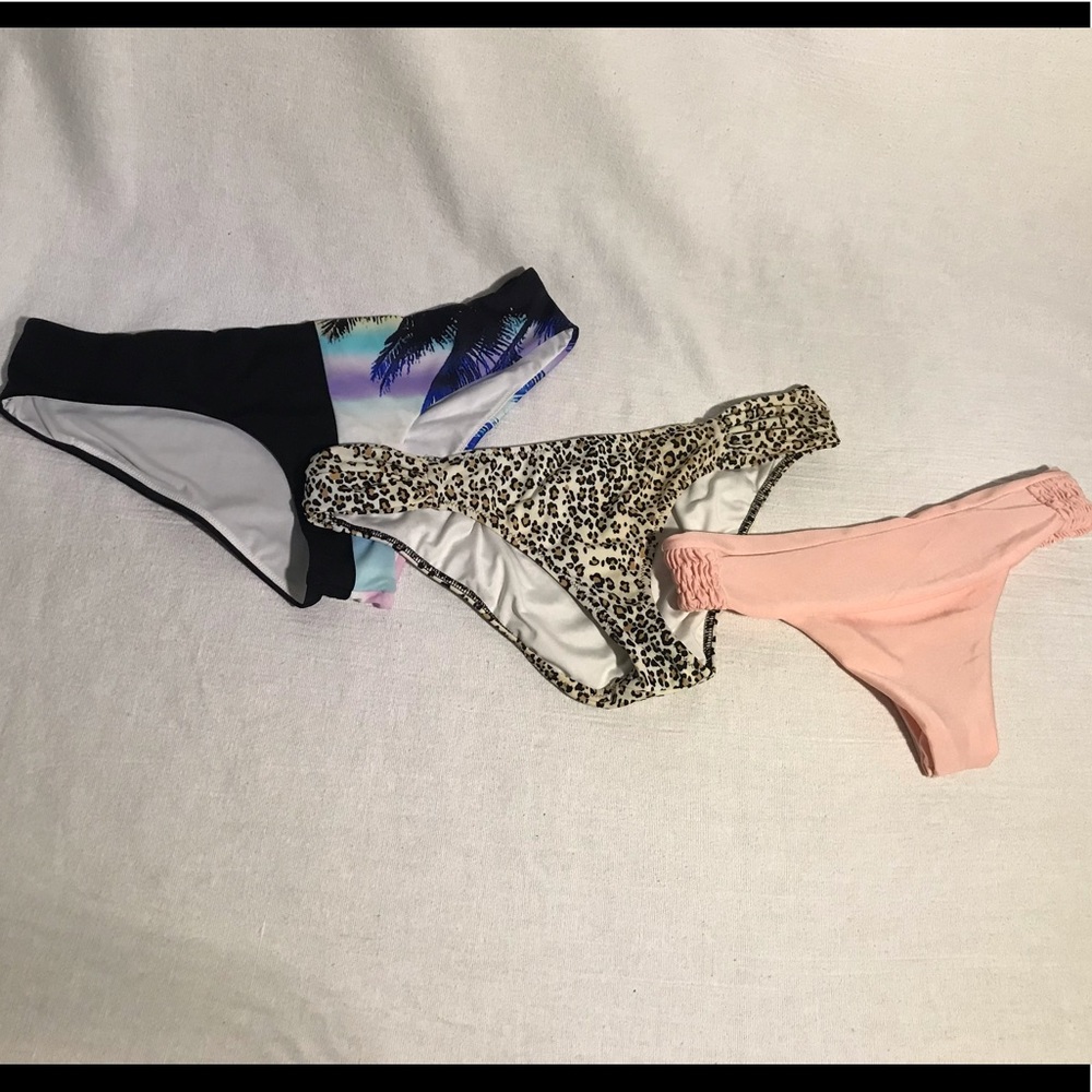 Bundle of 3 bikini bottoms.
